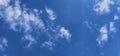 Beautiful billowing clouds (cumulus) in the deep blue sky.