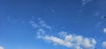 Beautiful billowing clouds (cumulus) in the deep blue sky.