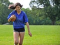 Beautiful biracial female football player Royalty Free Stock Photo