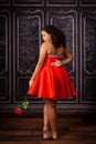 Beautiful, Biracial High School Senior wearing red prom dress