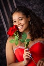 Beautiful, Biracial High School Senior wearing red prom dress Royalty Free Stock Photo