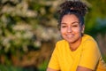 Beautiful Biracial Mixed Race African American Girl Smiling at Sunset Royalty Free Stock Photo