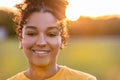 Beautiful Biracial Mixed Race African American Girl Smiling at Sunset Royalty Free Stock Photo