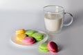 Beautiful biscuits of different colors for tea on a white background