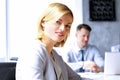 Beautiful bisness woman. business colleagues analyzing financial figures on a laptop Royalty Free Stock Photo