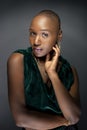 Black Female Fashion Model with Bald Hairstyle Looking Confident and Bold Royalty Free Stock Photo