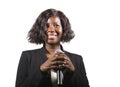 Beautiful black afro American business woman with microphone speaking in auditorium at corporate event or seminar giving Royalty Free Stock Photo