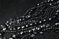 Beautiful black bead necklaces on a black background