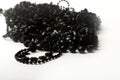 Beautiful black bead necklaces on a white background