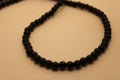 Beautiful black beads in a row Royalty Free Stock Photo