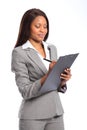 Beautiful black business woman with clipboard Royalty Free Stock Photo