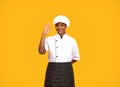 Beautiful Black Chef Woman Wearing Hat Showing Ok Gesture At Camera Royalty Free Stock Photo