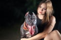 Beautiful black dog of american pitbull terrier breed, with attentive look, opened mouth with long tongue, old school ear cut, and Royalty Free Stock Photo