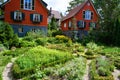 Herbary, Herb Garden with flowering Herbs planted in a circle in backyard of colorful houses in Baiersbronn, Black Forest, Germany Royalty Free Stock Photo