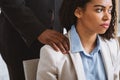 Beautiful black girl being victim of sexual harassment at worlplace, free space Royalty Free Stock Photo