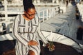 Beautiful black girl standing in a summer park