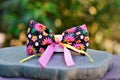 Graceful black hair ribbon with colorful flowers and ribbons for junina party