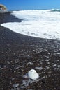 Beautiful black pebble beach at Kamari, Santorini - Thira, Cyclades, Greece Royalty Free Stock Photo