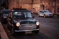 Beautiful black retro car parked on the street