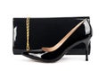 Beautiful black shoes with clutches on white isolated Royalty Free Stock Photo