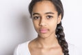 Beautiful black teen posing on studio white background looking sad Royalty Free Stock Photo