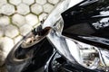 Beautiful black and white butterfly sitting on motorcycle, nature in urban contrast concept