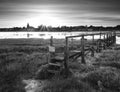 Beautiful black and white low tide landscape of Bosham Harbour w Royalty Free Stock Photo