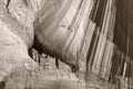 Beautiful black and white monochrome picture of Anazasi cave dwellings built in a cliff in Canyon de Chelly