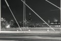 Beautiful black and white night photograph looking through a cable supported bridge towards the Chicago skyline and skyscraper Royalty Free Stock Photo