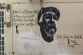 Beautiful black and white portrait on outside wall on walking street in Willemstad, Curacao. Street arts concept. Willemstad,