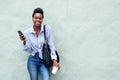 Beautiful black woman holding cellphone Royalty Free Stock Photo