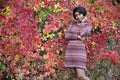Beautiful black woman in outside photo shoot at fall