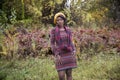 Beautiful black woman in outside photo shoot at fall