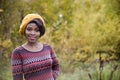 Beautiful black woman in outside photo shoot at fall