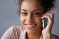 Beautiful black woman smiling with mobile phone Royalty Free Stock Photo