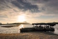 Beautiful blazing sunrise landscape at black sea and mountain above orange sky with awesome sun golden reflection on calm sea Royalty Free Stock Photo