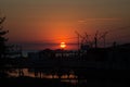 Beautiful blazing sunset landscape at black sea and orange sky above it with awesome sun golden reflection on calm waves as a Royalty Free Stock Photo