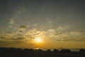 Beautiful blazing sunset landscape at Caspian sea and orange sky above it with awesome sun golden reflection on calm waves as a ba