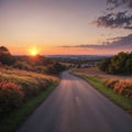 Beautiful blazing sunset landscape at over the meadow and orange sky above it. Amazing summer sunrise as a Royalty Free Stock Photo