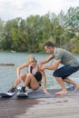 Beautiful blond active with waterskiing coach