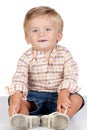 Beautiful blond baby with blue eyes Royalty Free Stock Photo