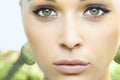 Beautiful blond girl with green eyes. beauty woman. nature Royalty Free Stock Photo