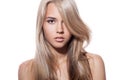 Beautiful Blond Girl. Healthy Long Hair. White Background Royalty Free Stock Photo