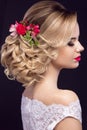 Beautiful blond girl in image of the bride with purple flowers on her head. Beauty face Royalty Free Stock Photo