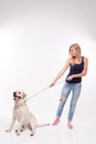 Beautiful blond girl with Labrador Retriever Royalty Free Stock Photo