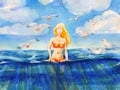 Beautiful blond girl in swimsuit standing in blue ocean Royalty Free Stock Photo