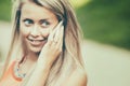 Beautiful blond girl talking phone Royalty Free Stock Photo