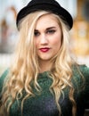 Beautiful Blond Teenage Girl in a Bowler Hat Royalty Free Stock Photo