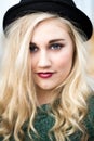 Beautiful Blond Teenage Girl in a Bowler Hat Royalty Free Stock Photo