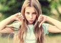 Teenage girl showing thumbs down Royalty Free Stock Photo